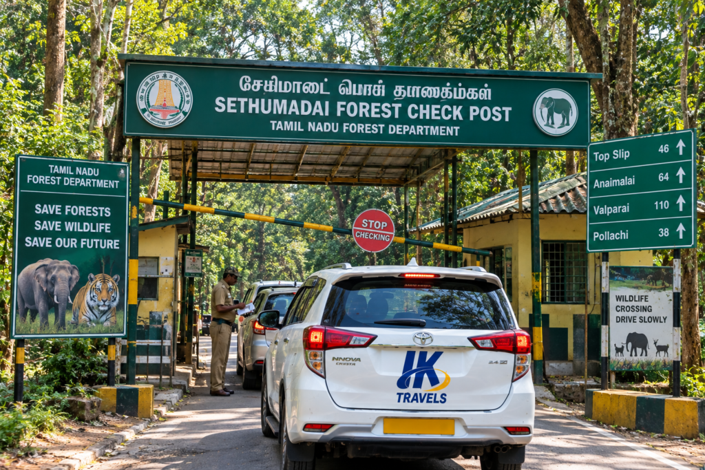 Vehicles waiting for entry clearance at the Sethumadai check post before driving up to Topslip.